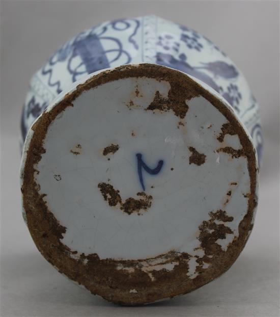 A Delft blue and white bottle vase, c.1700, 32.5cm, drilled and chipped